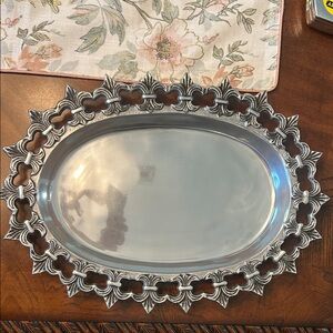 Pewter dish with fleur-de-lis accent